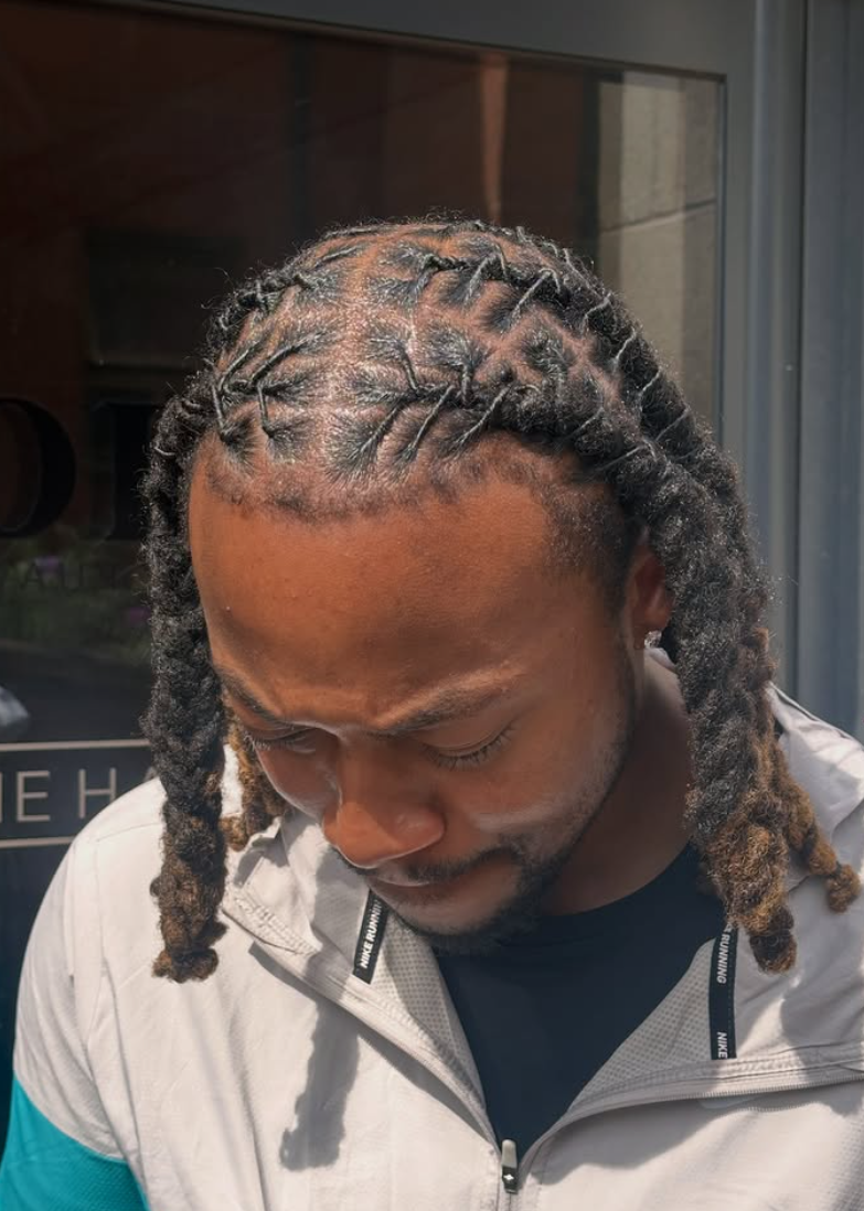 Men's twists with defined parting by Styled by PN