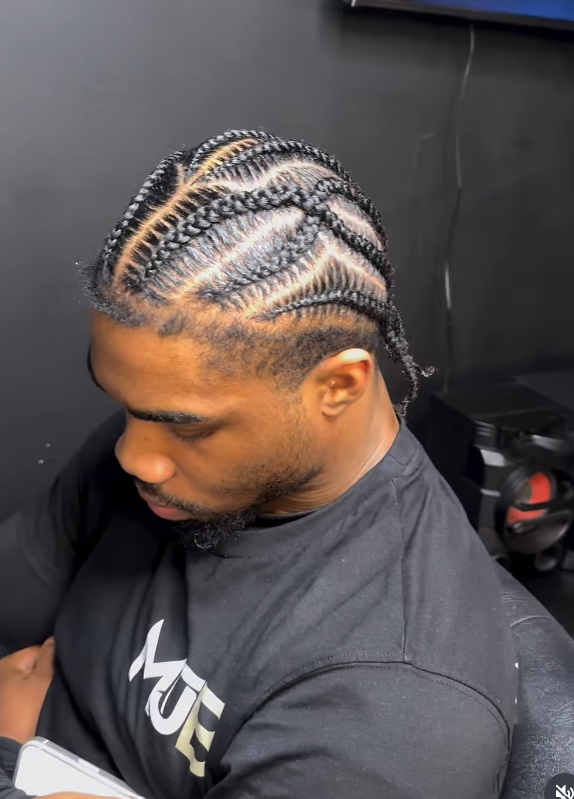 Men's stitched cornrows with intricate parting by Styled by PN